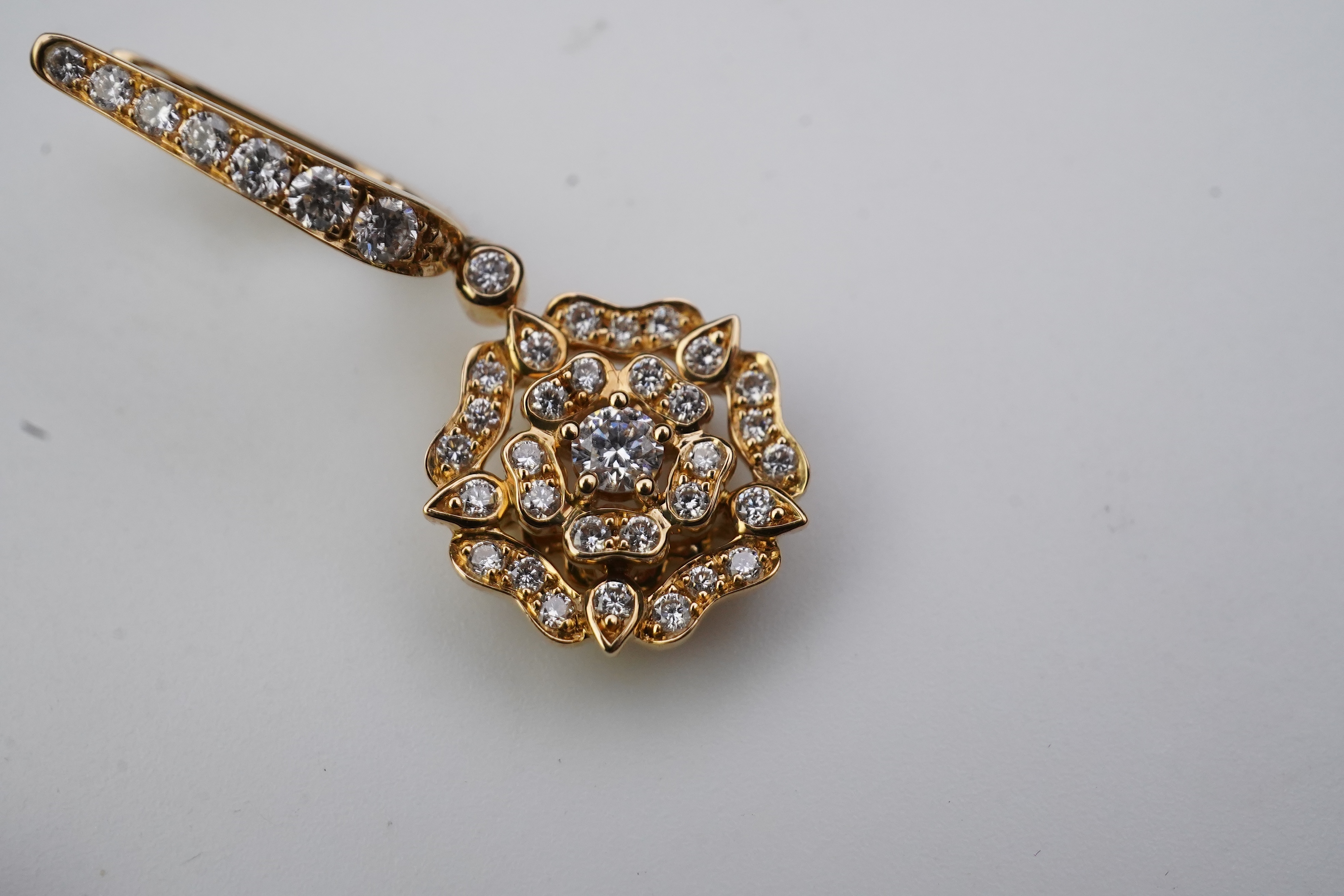 Garrard, a pair of diamond 'Tudor Rose Mini Icon' earrings